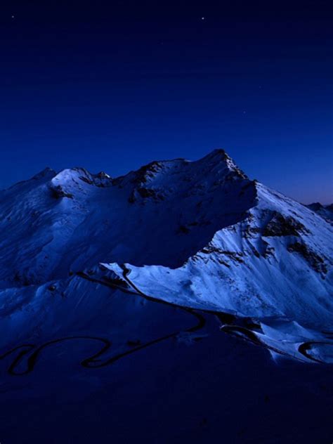 1668x2224 Dark Blue Sky Above Snow Covered Mountain 1668x2224