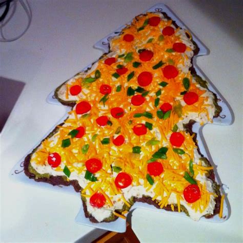 Not quite cookie, not quite cake. Mexican layer dip Christmas tree. | Mexican food recipes, Mexican fiesta, Snacks
