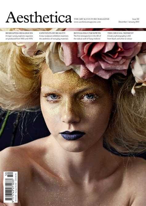 A Woman With Flowers In Her Hair And Makeup On The Cover Of Aesthetica