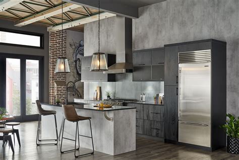 An Artistically Modern Loft Kitchen With Rough Natural Elements And A