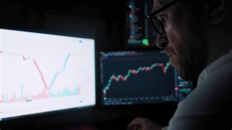 Male Trader Analyzes The Stock Market By LightShoot VideoHive