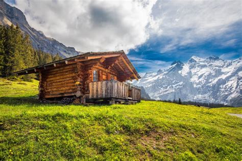 Wooden Swiss Chalet In Swiss Alps Near Kandersteg And Oeschinnensee