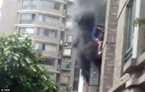 Video Shows Chinese Man Throw His Daughter From A Burning Building