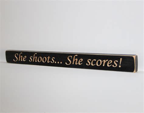 She Shoots She Scores Sign