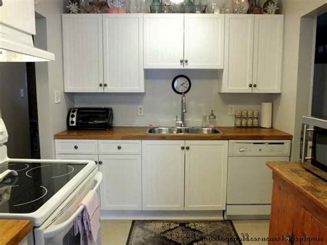 Refacing cabinets with melamine, which can cost less than $3,000, is a cheaper option than wood veneer, which can run $7,000 to $9,000 or more. Melamine Kitchen Cabinets Makeover
