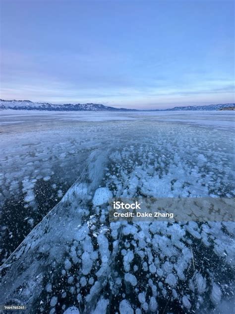 Frozen Lakes And Ice Bubbles In Winter Stock Photo Download Image Now