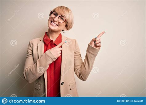 Young Blonde Business Woman With Short Hair Wearing Glasses And Elegant