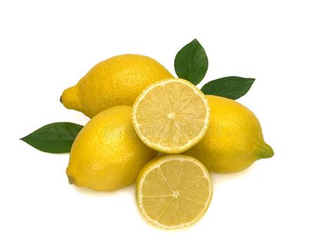 Three Whole Yellow Lemons And Two Halfs With Green Leaves Isolated On