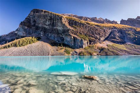Turquoise Water Of The Scenic Lake Louise Stock Photo