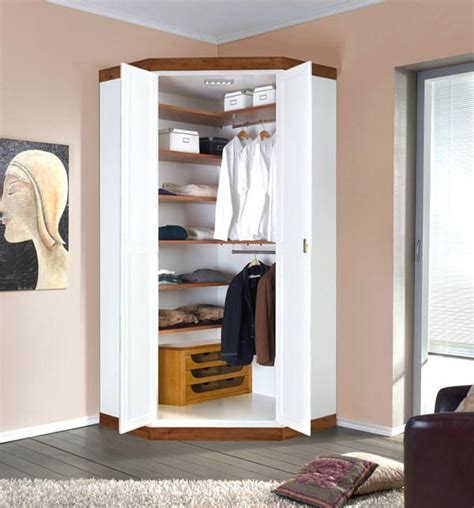 The wardrobe is made out of oak wood with a smooth finish on the outside and a natural look on the inside, fitted with hooks and an read about the terms in the limited warranty brochure. Furniture Amazing Corner Wardrobe Closet 13 Small Bedroom ...