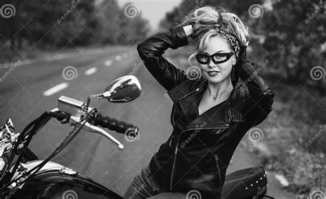 Black And White Photo Of Beautiful Biker Women Posing With Motorcycle