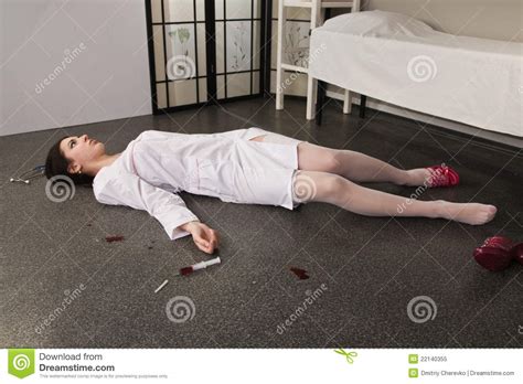 Powder lying on the floor around the powder spraying device is a potentially dangerous source of slipping. Nurse Lying On The Floor Royalty Free Stock Photo - Image ...