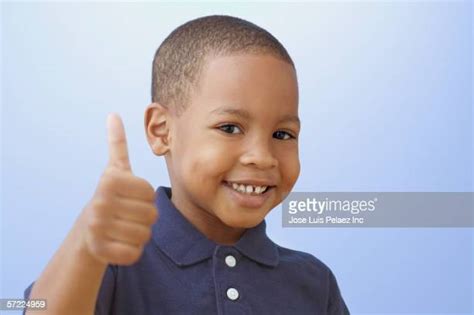 Cute Kid Thumbs Up Photos And Premium High Res Pictures Getty Images