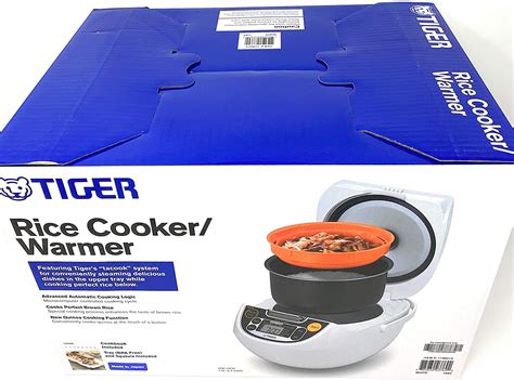 Amazon Com Tiger 5 5 Cup Micom Rice Cooker Warmer Steamer Home