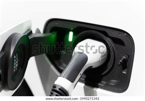 Electric Vehicle Charging Port Plugging Ev Stock Photo 1990271342