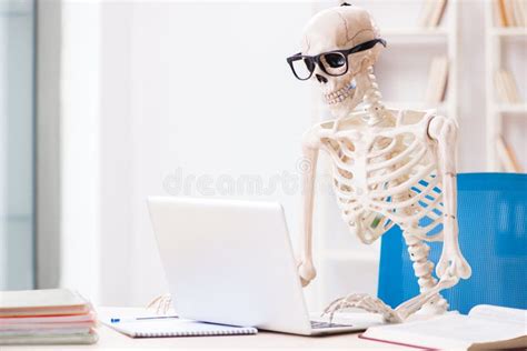 The Skeleton Businessman Working In The Office Stock Photo Image Of