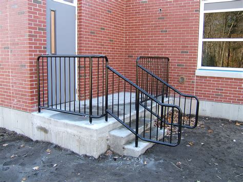 Stainless steel handrails deliver a streamlined, modern look for both indoor and exterior applications. Exterior Stair Railings | Custom metal fences | Custom Rail Tech