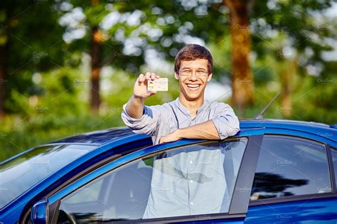 Guy With Driving License Transportation Stock Photos Creative Market