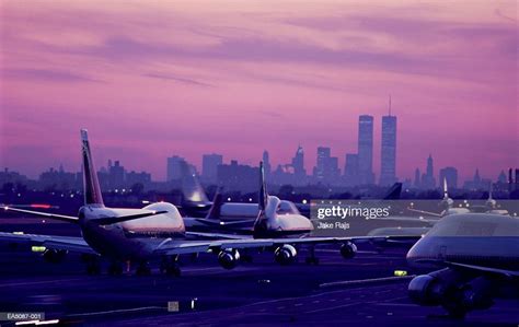 Usa New York City Jfk Airport Aircraft Taxiing At Sunset High Res Stock