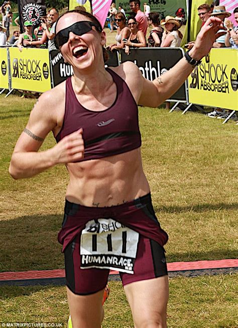 Mel C Displays Her Six Pack And Bulging Muscles As She Completes