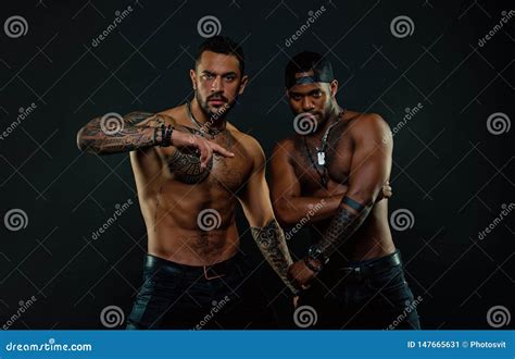 Men With Fit Tattooed Bodies African And Hispanic Men With Bare Torsos Stock Image Image Of