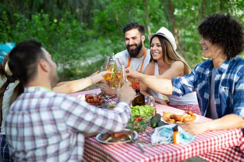 Small Group Of Friends Having Fun At Barbecue Party Stock Image Image Of Adult Outdoor 191976879