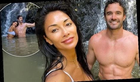 Nicole Scherzinger And Beau Thom Evans Pose Beside Waterfall In Hawaii