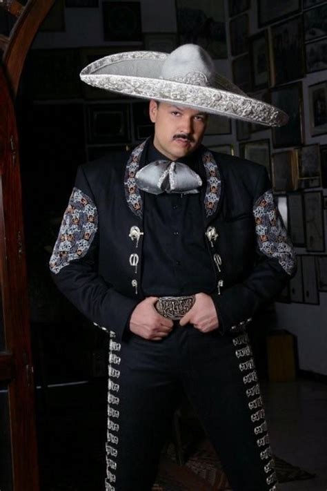 Mariachi Singer Wearing Silver Embroidered Charro Suit Mariachi Suit