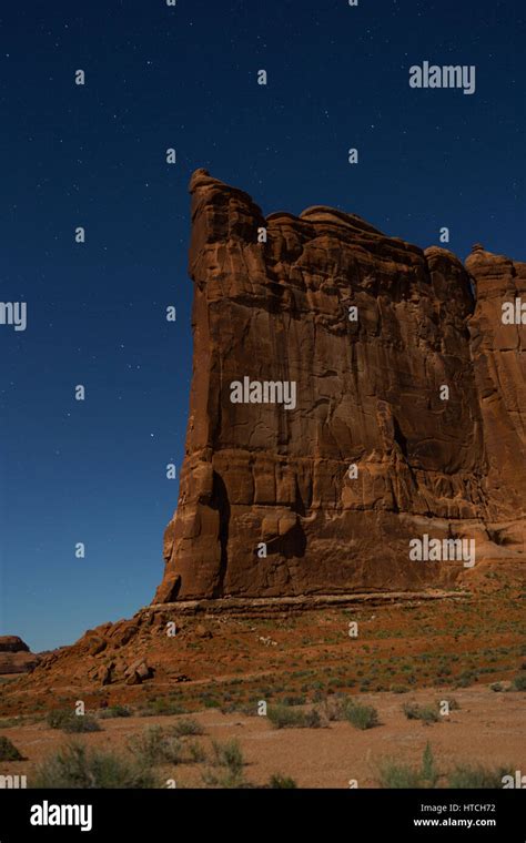 Tower Of Babel Under Night Sky And Moonlight Arches National Park Ut