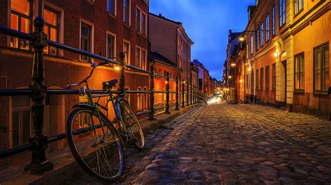 Photo Stockholm Sweden Bicycles Fence Street Night Time 1920x1080
