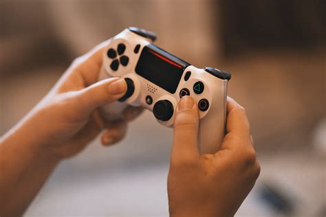 Person Holding Sony Ps4 Controller · Free Stock Photo