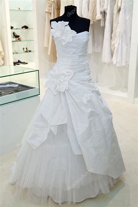 Wedding Dress On A Mannequin In A Bridal Shop Stock Photo By ©gsermek