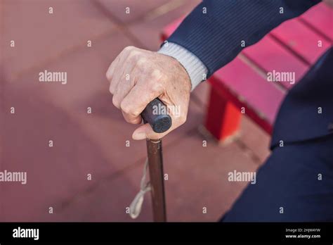 Old Man Hand Holding Walking Stick Outdoor Stock Photo Alamy