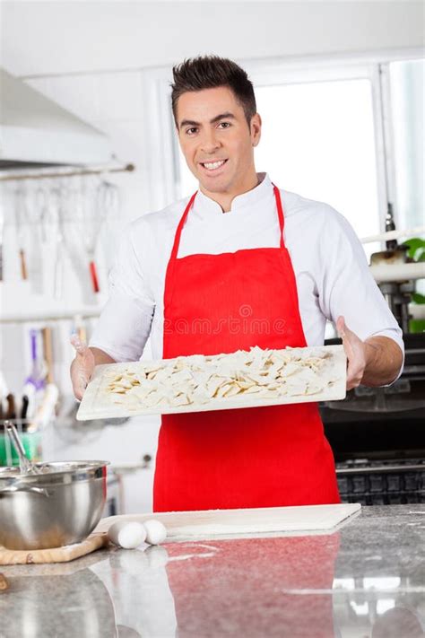 Happy Chef Holding Raw Ravioli Pasta Cutting Stock Photos Free