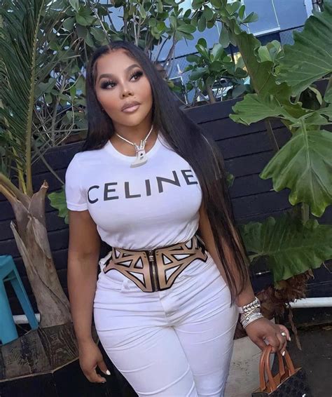 Lil Kim Attends Rolling Loud’s Opportunity Matters Panel In Miami Wearing White Look Featuring