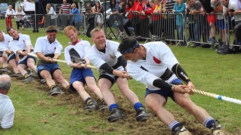 Each team positions themselves at opposite ends of the rope and then, when it starts, they all start pulling their end to see which team is stronger. 2015 UK Tug of War Championships - Men 600kg Final Second ...