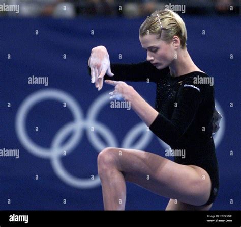 russian gymnast svetlana khorkina performs her floor routine during the women s all around final