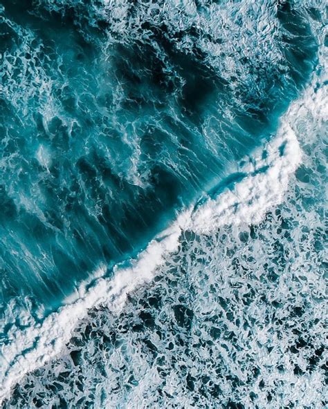 Wave Aerial Photography Capturing The Salt Water Crashing By