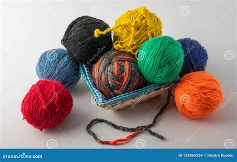 Colored Wool Knit Balls Placed On A Stock Photo Image Of Blue