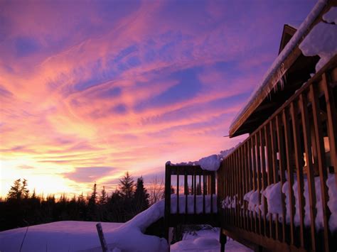 Winter Cabin At Sunset