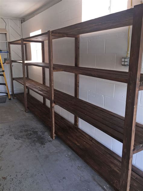 They're the perfect size for those giant plastic bins, and are great for storing camping gear and christmas. stained 2x4 DIY Garage Storage Favorite Plans | Ana White ...