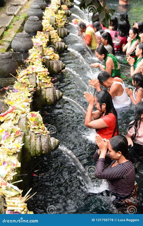 Devotees At Ritual Purification Tirta Empul Tampaksiring Gianyar Regency Bali Indonesia