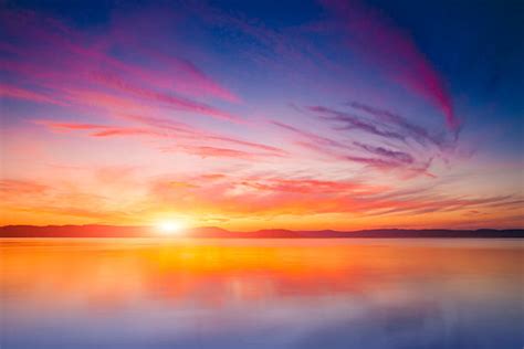 Sunset Over Water Stock Photos Pictures And Royalty Free Images Istock