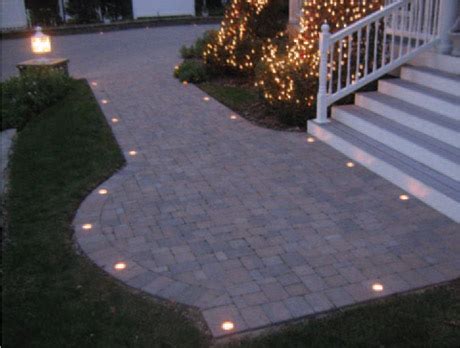 Options can range from using the same paver at a different angle to choosing a contrasting color, shape and/or style of paver (or more than one). Lighting for your driveway or patio.- Wall and Paver Lighting
