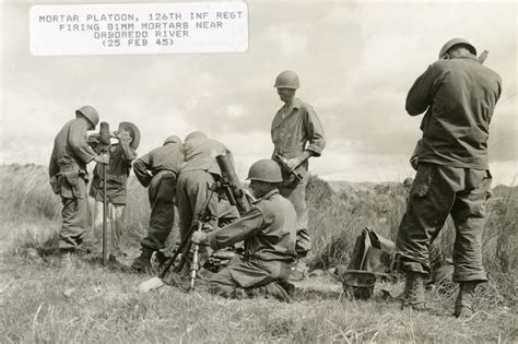 Mortar Platoon 126th Infantry Regiment Firing 81mm Mortars Near The