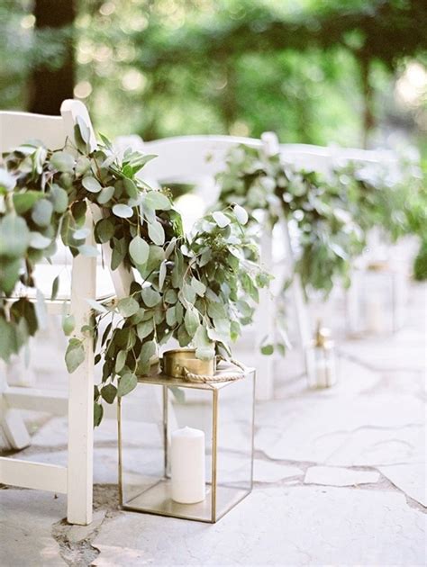 Wedding Aisle With Lantern And Greenery Decorations Emmalovesweddings
