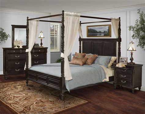 King size canopy bed such as the one shown in the picture offers comfortable rest for the couple at the same time adds an elegant touch to the bedroom. Martinique Rubbed Black King Canopy Bed With Drapes from ...