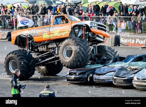 The Podzilla Monster Truck Jumping Cars During A Live Performance At