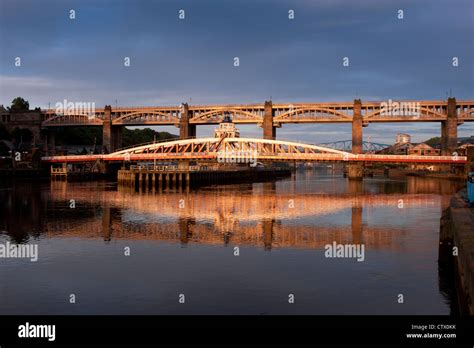 The Swing Bridge And High Level Bridge Over The River Tyne Lit By Early
