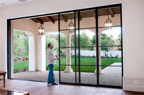 4 classic, black framed, black glass sliding wardrobe doors. Steel Pocket Sliding Doors - Mediterranean - Patio ...